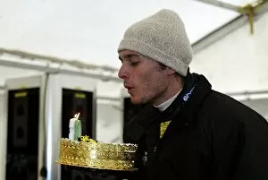Images Dated 15th January 2003: Jordan EJ13 Shakedown Test: Giancarlo Fisichella celebrates his 30th birthday with a cake