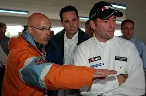 Sponsor Gallery: Jos Verstappen (NED) Minardi, right, talking with Rob Kamphuis (NED) Dutch TV presenter