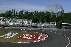 Images Dated 24th August 2002: Kenny Brack and Tora Takagi negotiate the hairpin of the Circuit Gilles Villeneuve during practice