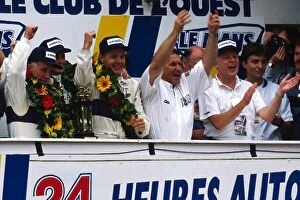Images Dated 20th February 2004: Le Mans 24 Hour Race: The Silk Cut Jaguar team celebrate their 1-2 finish on the podium
