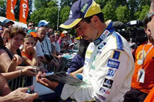 Le Mans Inspection-June 12, 2006-Luc Alphand signs autographs. World Copyright-Dave Friedman / LAT Photographic 2006