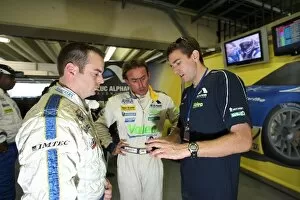 Images Dated 12th November 2007: Le Mans Series: Olivier Beretta and Oliver Gavin in discussion with a Luc Alphand Adventures