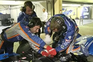 Images Dated 12th November 2007: Le Mans Series: Pescarolo Sport mechanics work on the front suspension
