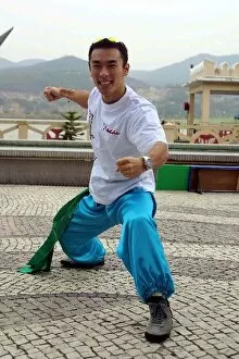 Images Dated 14th November 2001: Macau Grand Prix: Takuma Sato tries martial arts in Macau