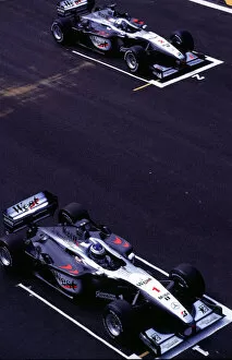 Images Dated 27th March 2000: McLaren-Both teamates on starting grid