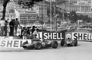 1960s F1 Collection: Monte Carlo, Monaco. 22 May 1966: John Surtees, Ferrari 312, retired, leads Jackie Stewart