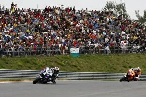 Images Dated 17th July 2011: MotoGP: Jorge Lorenzo, Yamaha Factory Racing, leads Andrea Dovizioso, Repsol Honda Team