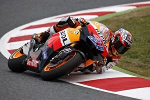 Motorbikes Collection: MotoGP: Race winner Casey Stoner, Repsol Honda