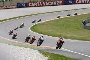 Rd4 Italian Grand Prix Collection: MotoGP: Race winner Dani Pedrosa leads the start of the race