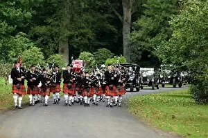 Images Dated 23rd September 2003: Mount Stuart Classic: The Scottish pipe band lead the Mount Stuart classic car parade