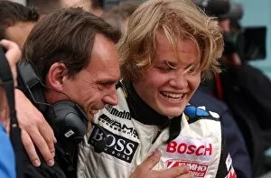 Images Dated 28th April 2003: Nico Rosberg (FIN), Team Rosbergl, being congratulated by one of the team members after his third
