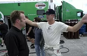 Images Dated 26th March 2004: OWRS Champ Car Testing: Ryan Hunter-Reay Herdez Competition talks to crew members