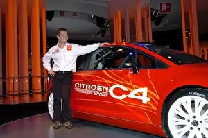 Images Dated 24th September 2004: Paris Motor Show: Citroen WRC driver Sebastien Loeb with the Citroen C4