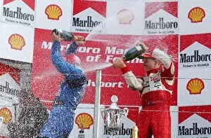 Images Dated 10th August 2003: Podium, champaign for Christian Klien (AUT), ADAC Berlin-Brandenburg, and Ryan Briscoe