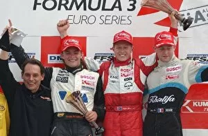 Images Dated 12th May 2003: The podium (L to R): Nico Rosberg (FIN) Team Rosberg Dallara-Opel, second; Ryan Briscoe