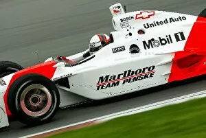 Images Dated 22nd April 2002: Pole sitter Gil de Ferran (BRA) Team Penske Dallara Chevrolet lucked out when a decision to stay