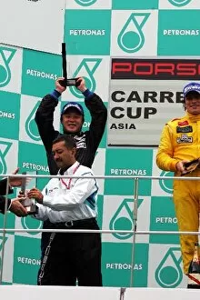 Asia Gallery: Porsche Carrera Cup Asia: Marchy Lee celebrates his second position on the podium
