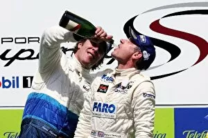Images Dated 13th May 2007: Porsche Supercup: Patrick Huisman and Richard Westbrook celebrate on the podium