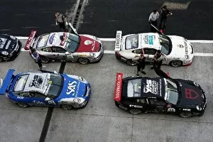 Images Dated 31st October 2009: Porsche Supercup: Porsche cars in the pits