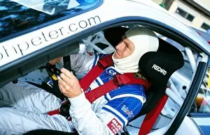Images Dated 28th May 2002: Porsche Supercup: Race winner Philipp Peter prepares for the race in the cockpit of his Porsche