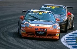 Images Dated 31st July 2001: Porsche Supercup: Second place finisher Stephane Ortelli leads the race winner Timo Bernhard ├É