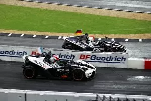 Stadium Gallery: Race of Champions: L-R: Adam Carroll vs Michael Schumacher compete in the KTM X-Bow