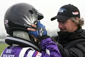 Images Dated 7th November 2006: The Race Sky One Tv Show: Eddie Irvine adjusts the helmet of Miss Dynamite