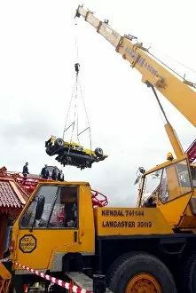 Images Dated 24th July 2003: Ralph Firman Drives the Big One: The Jordan Ford EJ13 is hoisted onto the Big One rollercoaster