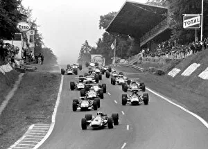Images Dated 15th November 2005: Rouen-les-Essarts, France. 7 July 1968: Jackie Stewart leads Jochen Rindt, Jacky Ickx
