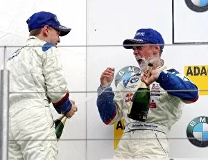 Images Dated 20th August 2003: Second place Sebastian Vettel (GER), Eifelland Racing, left, spraying champagne in the face of