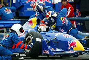 Fuel Collection: Seventh placed Eddie Cheever (USA) Red Bull Racing Dallara Infiniti makes a pit stop