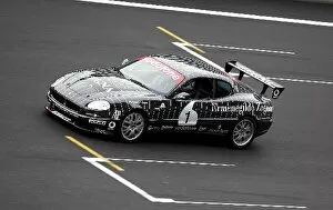 Images Dated 7th June 2004: Shanghai Circuit Opening: A Maserati Trofeo Cup car takes part in the opening ceremony