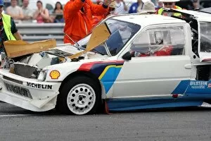 Images Dated 27th July 2008: Silverstone Classic: Peugeot 205 T16 Rally Car is rolled back onto its wheels after rolling during
