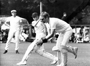 Sir John Whitmore and Jim Clark (background) enjoy a game of cricket. ©LAT