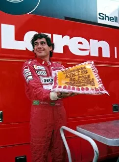 1990 Collection: Sutton Motorsport Images Catalogue: Ayrton Senna McLaren was presented with a cushion to