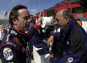 Images Dated 24th March 2002: Team owner Bobby Rahal (USA) and driver Jimmy Vasser (USA), talk over their options after