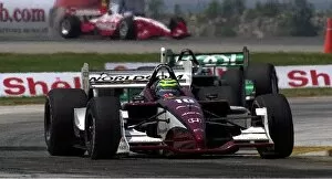 Images Dated 15th July 2002: Tony Kanaan, (BRZ), Honda / Lola, led Paul Tracy early, but faded to eighth at the finish of