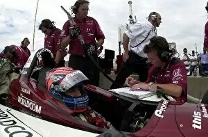 Images Dated 1st June 2002: Tony Kanaan talks to his engineer during practice for the Miller Lite 250