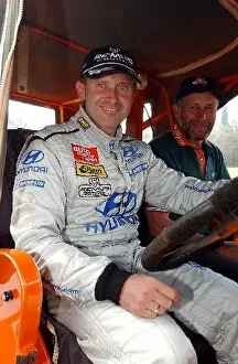 Images Dated 17th September 2003: World Rally Championship: Armin Schwarz Hyundai Accent WRC gets to drive a tractor