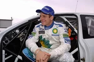2004 WRC Gallery: World Rally Championship: Leg 1 rally leader Francois Duval sits in the doorway of his Ford Focus