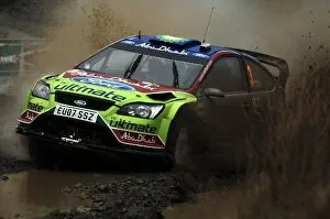 Cardiff Gallery: World Rally Championship: Mikko Hirvonen Ford Focus WRC loses control at the watersplash in Sweet Lamb