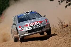 Images Dated 4th November 2002: World Rally Championship: Rally winner Marcus Gronholm / Timo Rautiainen Peugeot 206 WRC