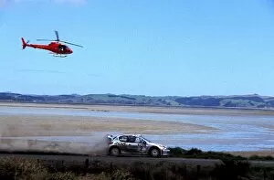 Images Dated 9th October 2002: World Rally Championship: The safety helicopter keeps and eye on Marcus Gronholm