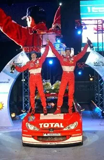 Images Dated 10th February 2003: World Rally Championship: Timo Rautiainen Peugeot and Marcus Gronholm Peugeot celebrate their