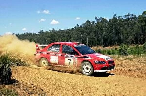 Images Dated 2nd November 2001: World Rally Championship: Tommi Makinen Mitsubishi Lancer EVO VII kicks up the dust on stage 2