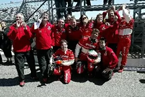 Images Dated 27th May 2004: World Series By Nissan: Members of Team Epsilon Euskadi celebrate 3rd place in parc ferme